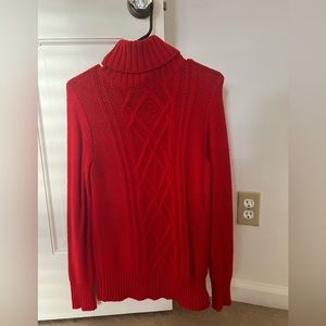 Red turtleneck sweater